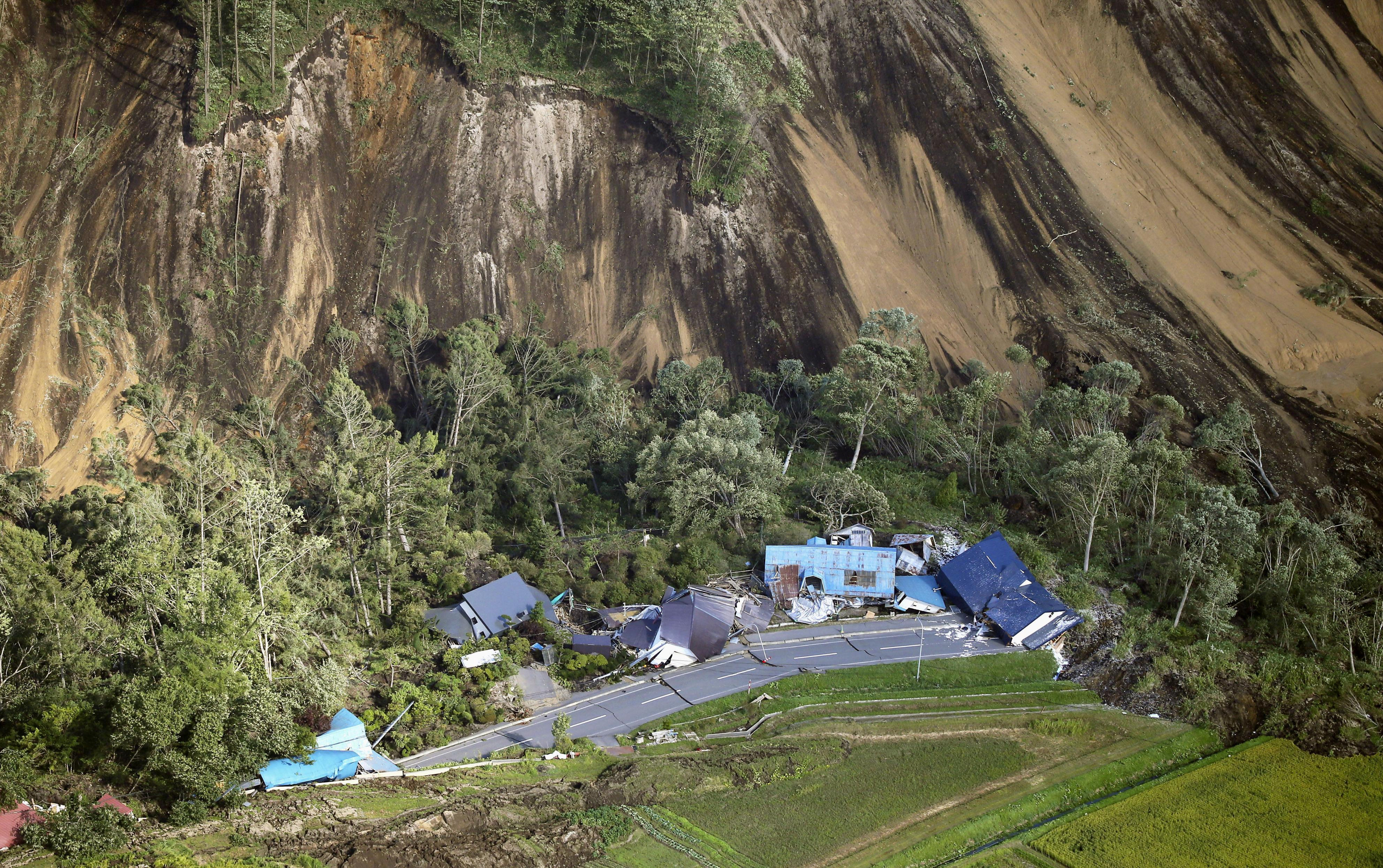 Japanese Earthquake Triggers Deadly Landslides, Knocks Out Power To ...