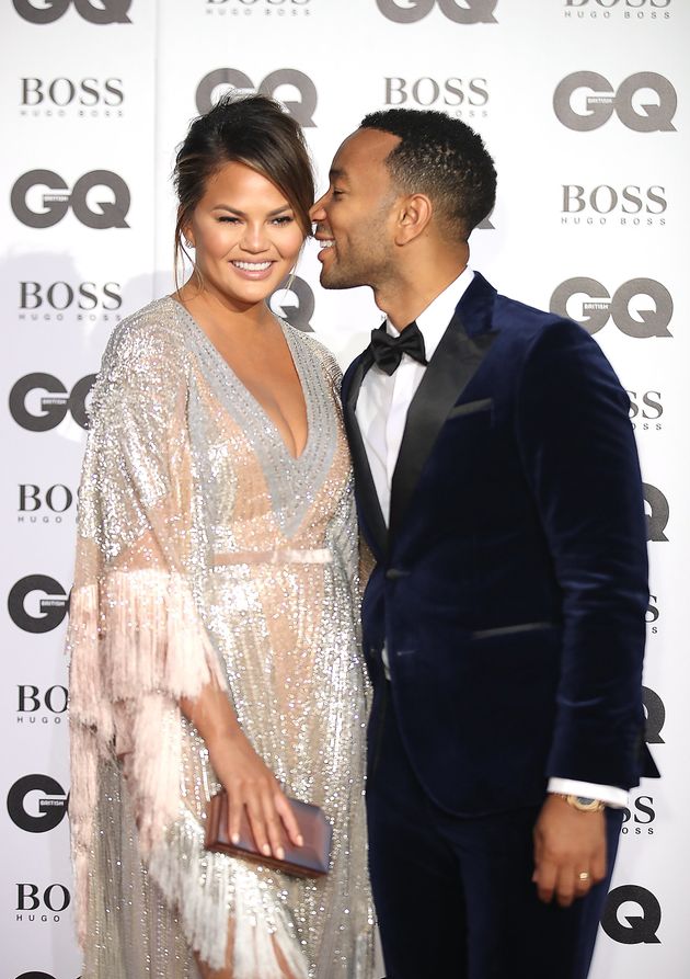 Chrissy and John on the red carpet