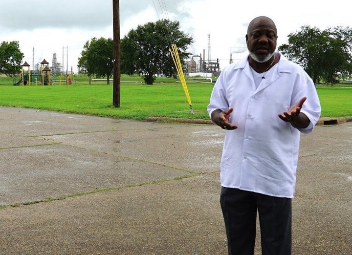 <p>Hilton Kelley in Port Arthur, Texas, explaining how homes, parks and playgrounds lie near the city’s oil refineries</p>