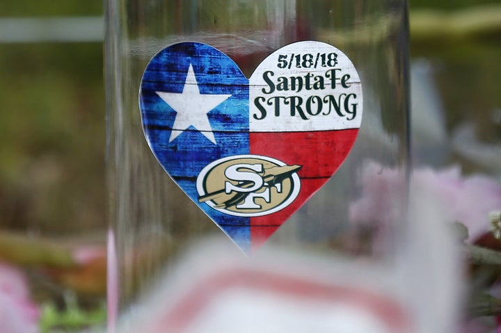 Part of a makeshift memorial for victims of the May 2018 shooting at Santa Fe High School in Santa Fe, Texas. The suspect in the attack, a 17-year-old student at the school, allegedly obtained weapons from his father’s closet, where they were left unsecured.