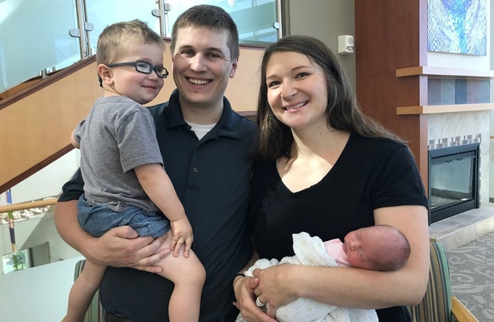Emily and Jeremy Eekhoff with newborn Ruby and son Liam, 2, in 2017. Emily credits “counting the kicks” with saving Ruby, who