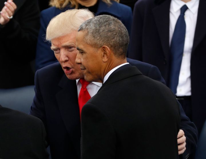 President-elect Donald Trump speaks to President Barack Obama before inauguration ceremonies on Jan. 20, 2017.