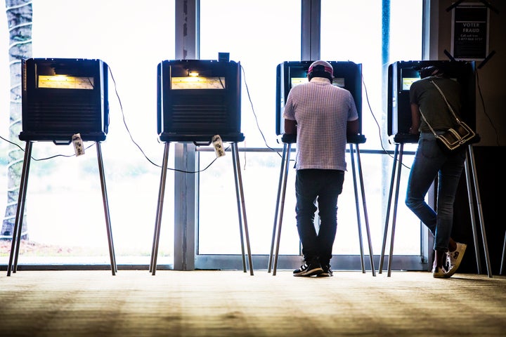 People casting ballots in the state’s primary elections in Doral, Florida, in August. On Sept. 7, a U.S. district judge ordered 32 of the state’s 67 counties to provide election materials in Spanish for voters.