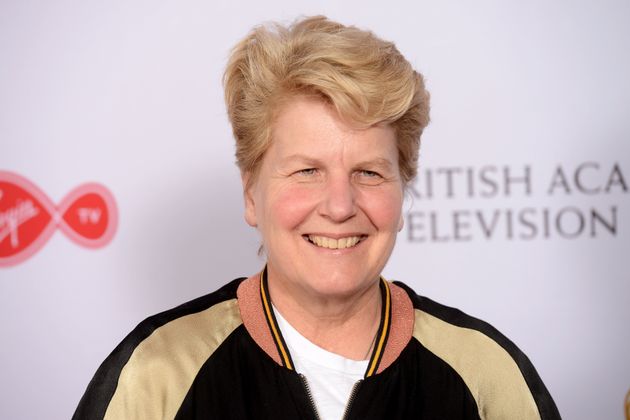 'QI's' Sandi Toksvig has said she earns a lot less than her predecessor Stephen Fry.