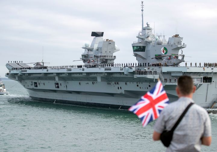 HMS Queen Elizabeth pictured leaving Portsmouth Harbour in Hampshire