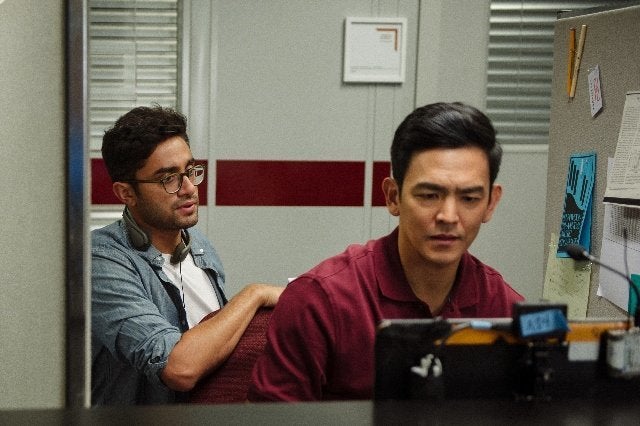 Director Aneesh Chaganty (left), with actor John Cho (right), on the set of "Searching."