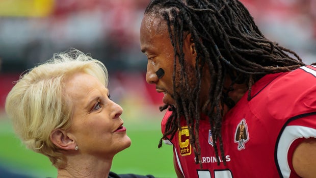 Sep 9, 2018; Glendale, AZ, USA; Arizona Cardinals wide receiver Larry Fitzgerald (11) greets Cindy McCain, widow of former Arizona republican senator John McCain prior to the game against the Washington Redskins at University of Phoenix Stadium. Mandatory Credit: Mark J. Rebilas-USA TODAY Sports