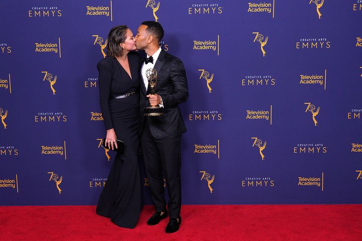 Chrissy Teigen and John Legend celebrate his Emmys win