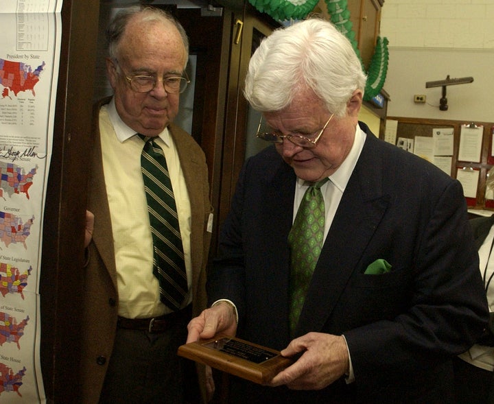 Former New York Times political reporter Adam Clymer, left, and Sen. Ted Kennedy (D-Mass.), inspect a plaque that was dedicated to the late Mary McGrory and hung in the Senate Press Gallery.