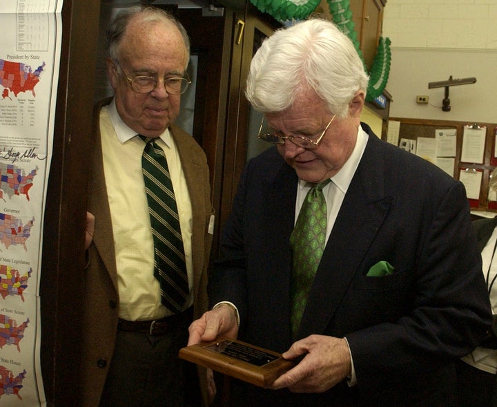 Former New York Times political reporter Adam Clymer, left, and Sen. Ted Kennedy (D-Mass.), inspect a plaque that was dedicated to the late Mary McGrory and hung in the Senate Press Gallery. 