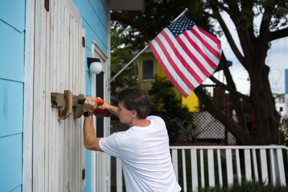 Photos Show Residents Preparing For Monster Hurricane