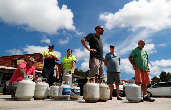 Customers line up to buy propane at Socastee Hardware store ahead of the arrival of Hurricane Florence in Myrtle Beach, South Carolina, on Monday.