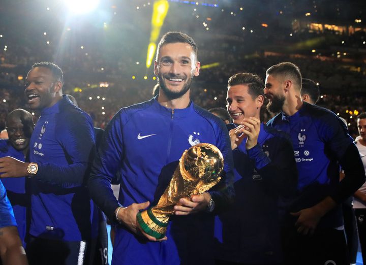 Hugo Lloris and team mates celebrate with the World Cup trophy earlier this year.
