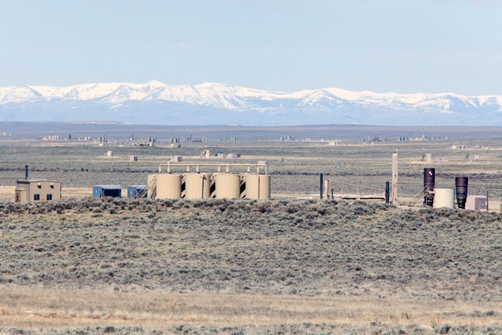 Gas wells and facilities are spread out across the landscape at Jonah Energy field, on May 4, 2018 outside Pinedale, Wyoming.