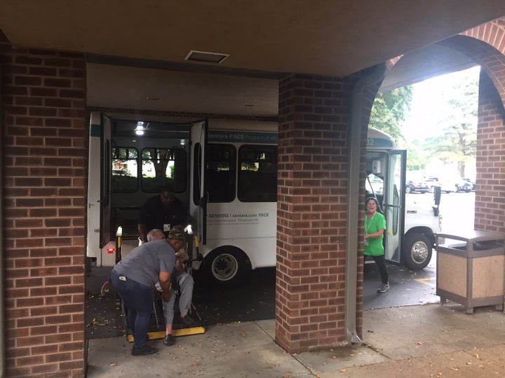 Residents from Sentara's Health Center in Currituck, North Carolina, arrive by bus at a larger Sentara facility in Portsmouth, Virginia, away from the storm's path.