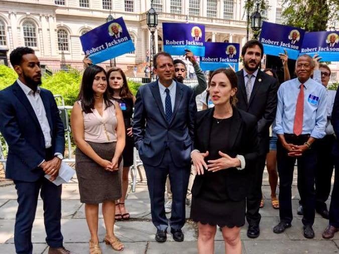 Alessandra Biaggi, foreground, speaks alongside Jessica Ramos, second from left, and fellow IDC challenger Robert Jackson, far right.