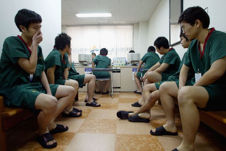 Students await a physical examination (FILE PHOTO)