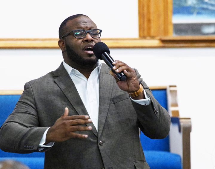 Botham Shem Jean leads worship at a Harding University reception in Dallas in 2017.