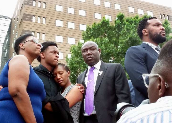 Allison Jean (far left), mother of Botham Shem Jean, stands alongside his brother and sister, as well as family attorneys Benjamin Crump and Lee Merritt, during a news conference on Sept. 10.