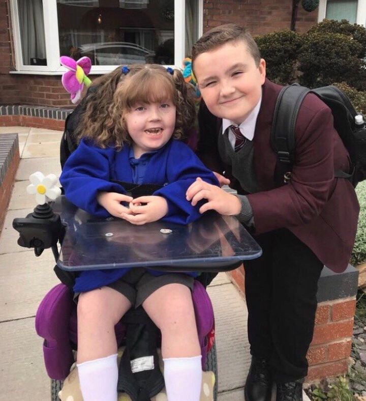 Nick Ollerenshaw, 12, helps look after his sister, Willow. He is one of thousands of children who look after a family member at home.