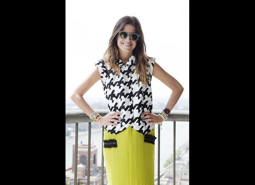Houndstooth vest and sunglasses.