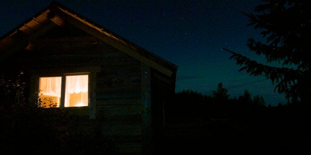 Light in a window on a cottage.