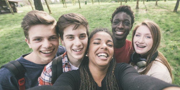 Group of Multiethnic Teenagers Taking a Selfie