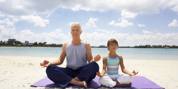 Man and Girl Meditating
