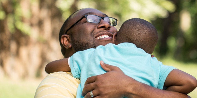 African American Father and son spending time together.African American Father and son spending time together.