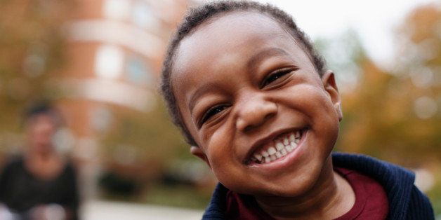Close up of smiling face of African American boy