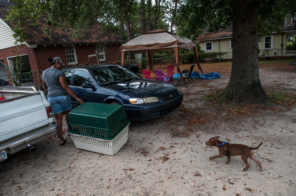 Matthew's wife, Tarus, helps with the evacuation process.