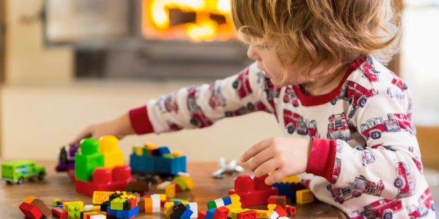 Caucasian boy playing with blocks