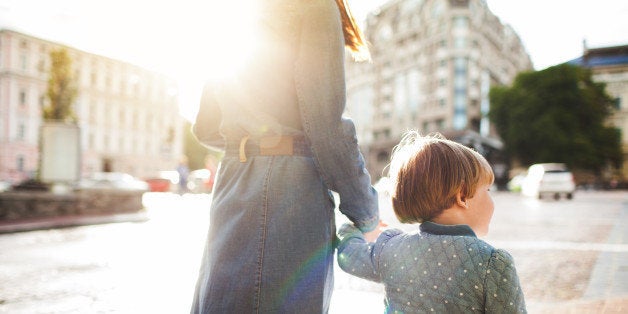 Mother with daughter having a walk