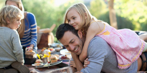 Family picnicking together outdoors