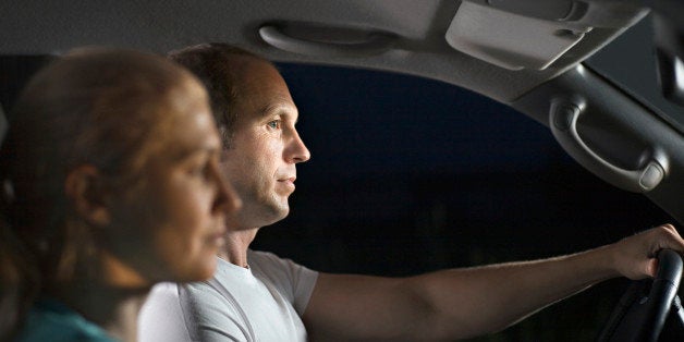 Mid adult couple in car