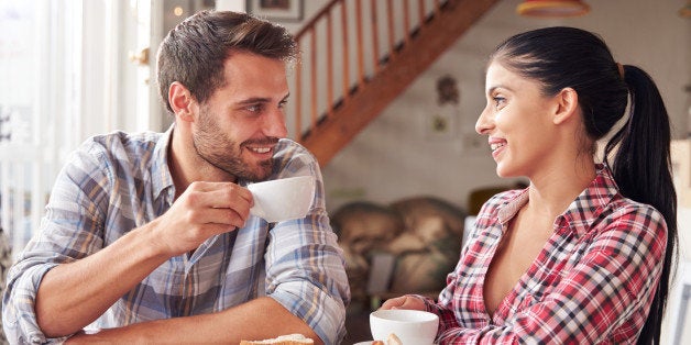 Couple meeting in a cafe ejoying a coffee together