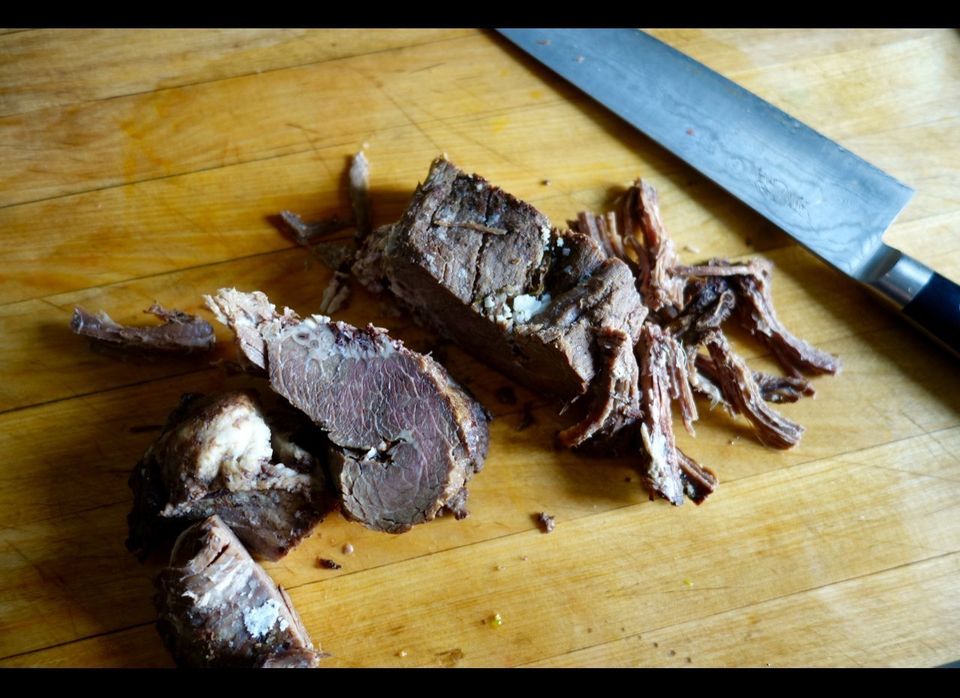Cold boiled beef. Choose something with long fibers like brisket or short ribs