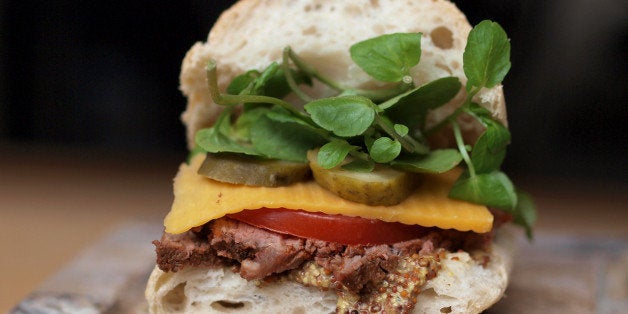 Everyone at work chipped in to make beef sandwiches for lunch. Quality ingredients: home made ciabatta, scottish beef, red leicester cheese, watercress, gherkin, tomato and honey mustard. I placed mine on a chopping board by the window and took a few snaps.