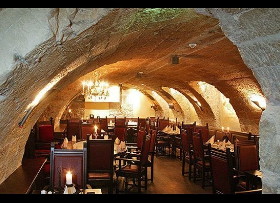 One of the several dining rooms, this one showing the cellar vaulting