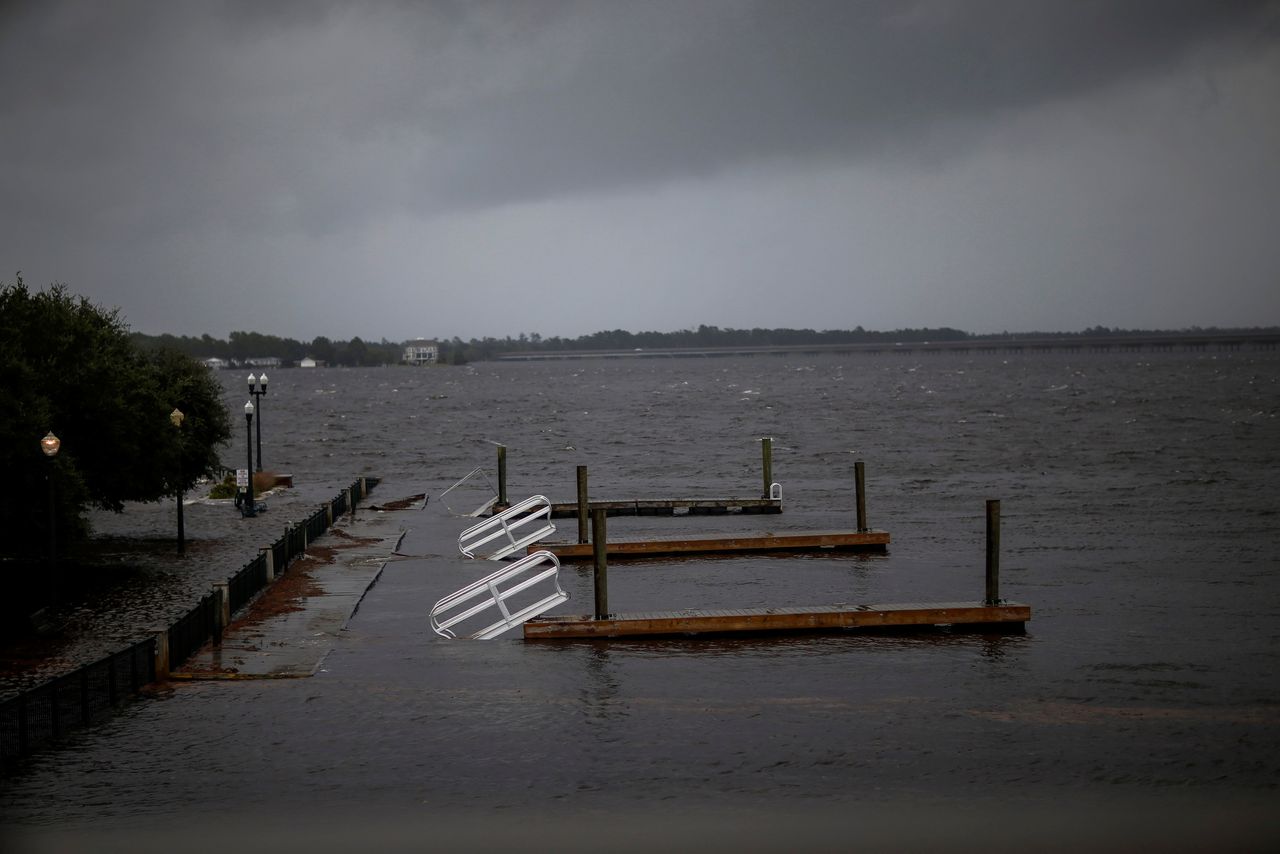 Docks broken by water from Neuse River.