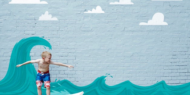 Boy surfing on cartoon wave