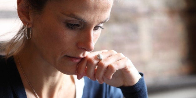 pensive woman in the cafe