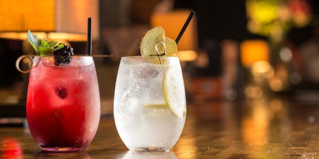 Two glasses of frozen lemonade on bar counterTwo glasses of frozen lemonade on bar counter