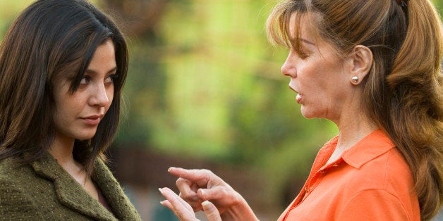 Woman lecturing daughter