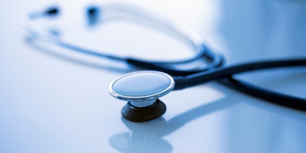 Close-up of stethoscope on desk in clinic