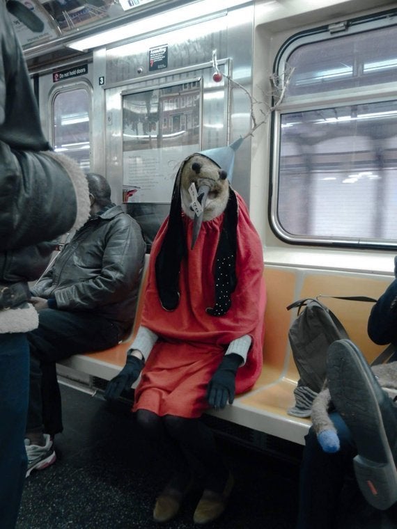 Rae Swon's demon-bird riding the subway. 