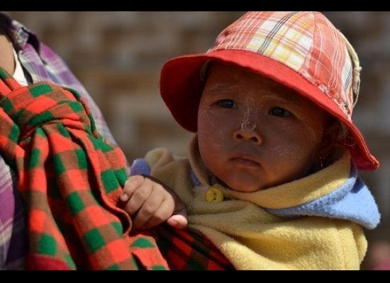 Baby with Thanaka Paste in Myanmar