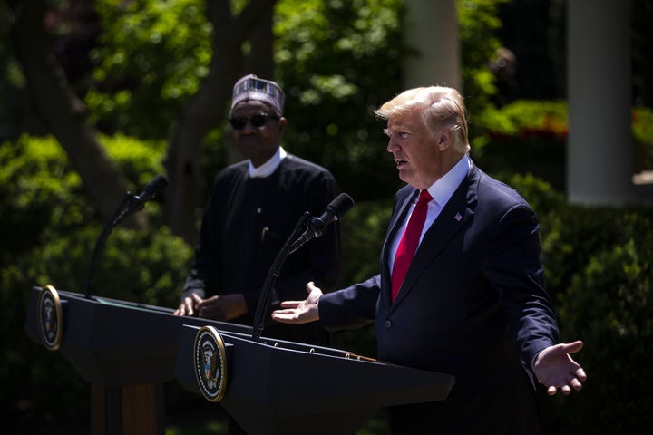 President Donald Trump speaks with Nigerian president Muhammadu Buhari. Nigeria is one of three new nations where Trump has used the 2001 authorization as justification for the deployment of U.S. troops.