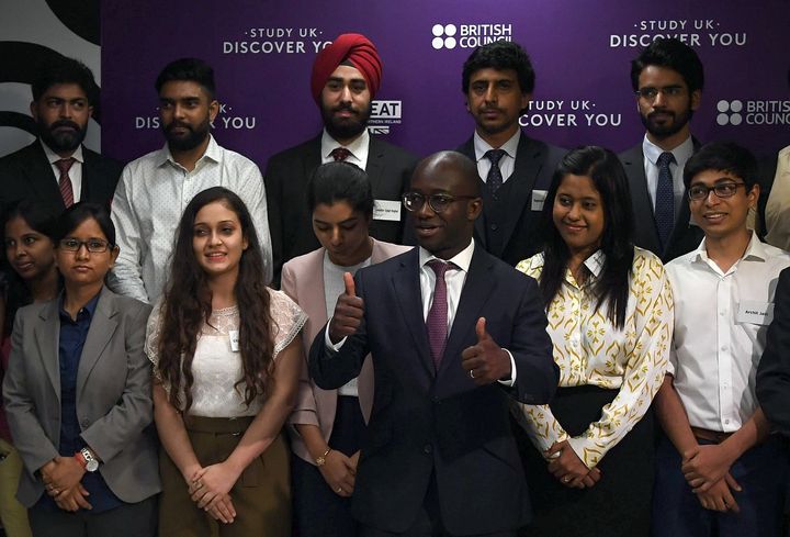 Sam Gyimah, pictured above meeting with Indian students go got scholarships in the UK, has written to university Vice Chancellors