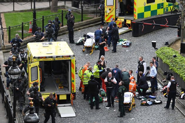 Emergency services at the scene outside the Palace of Westminster, London, where Pc Keith Palmer was fatally stabbed by Khalid Masood 